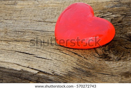 Heart shaped soap on the wooden background