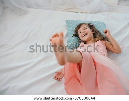 

Kids leisure scene.Happy childhood.Portrait of little enjoying girl.