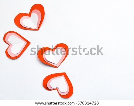 Fold paper Red White  hearts {Paper Heart stacked}, Heart of paper folding Isolated on White Background. Cards for Valentine's Day There is space for text "Happy Valentine's Day"