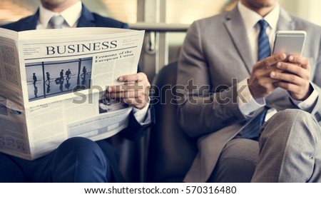 Business Men Break Sit Read Newspaper Royalty-Free Stock Photo #570316480