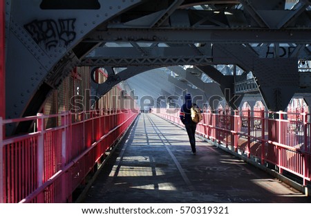 Traveler on the Williamsburg bridge New York