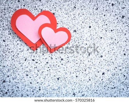 Cutting paper Red White  hearts {Paper Heart stacked}, Heart of paper folding Isolated on Marble Background. Cards for Valentine's Day There is space for text "Happy Valentine's Day"