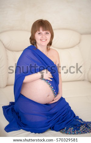 Pregnant woman in a sari