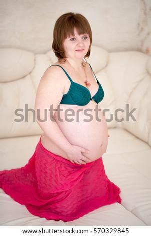 Pregnant woman in a sari
