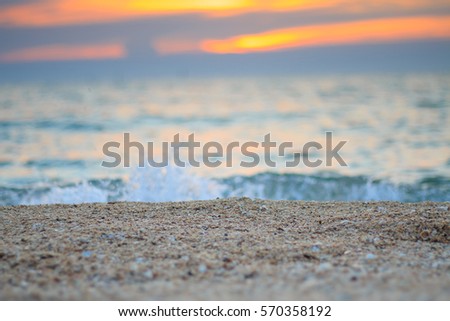 close up sand with blured sea  at sunset