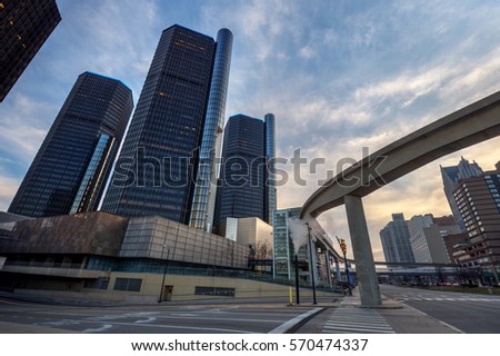 Three tall buildings together in an downtown urban view