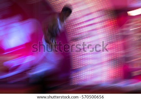 Abstract background of colorful blur dance of movement motion light running doing jump