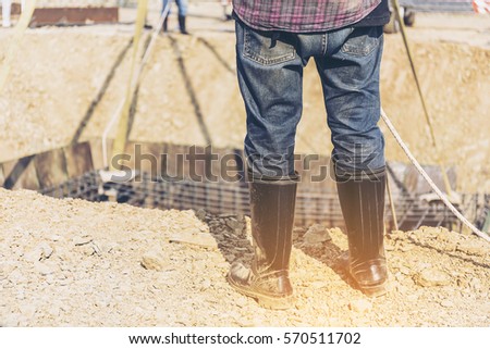 construction workers,Image of workers on a building construction,construction worker on construction site,Construction workers working in site building,factory piling