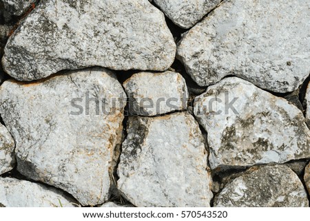 Antique old cracked stone wall retro background