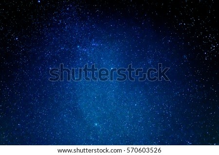 Beautiful scenery of blue night sky with stars. Star trails