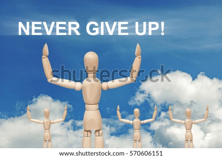 Wooden dummy puppet on sky background with words NEVER GIVE UP. Abstract conceptual image.