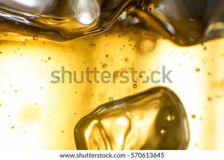 alcohol drink beer on macro picture with sparkles and foam useful for background