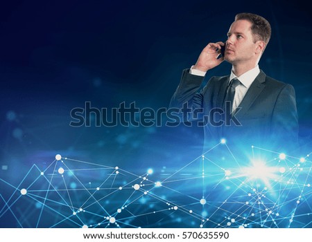 Handsome businessman talking on the phone on abstract blue background with connected dots. Technology and communication concept