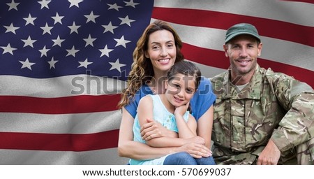 Soldier reunited with his family against american flag background