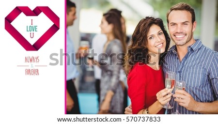 Digital image of smiling couple with a glass of champagne on a Valentin card