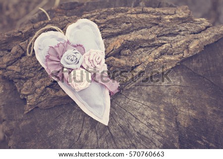 Hand-made heart on a wooden background. Background, Valentine's Day, Mother's Day