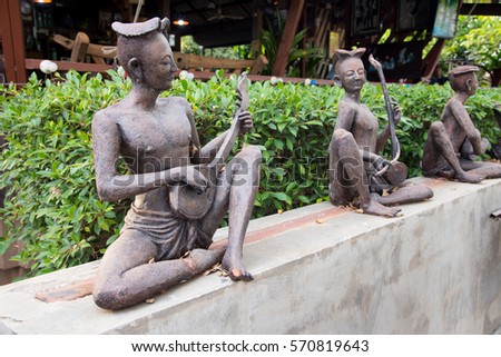Thai ceramic dolls with play music Royalty-Free Stock Photo #570819643