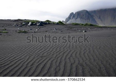 Textures on a black beach