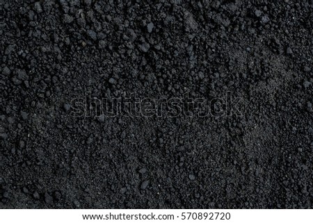 Closeup Black color soil texture Royalty-Free Stock Photo #570892720