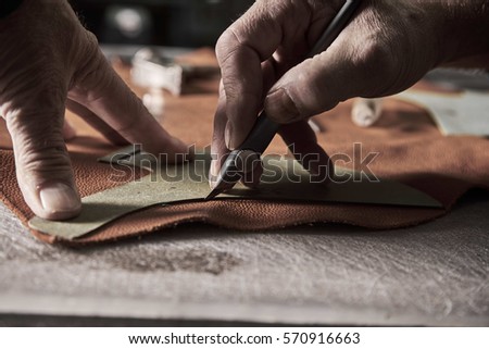 Shoe production process in factory Royalty-Free Stock Photo #570916663