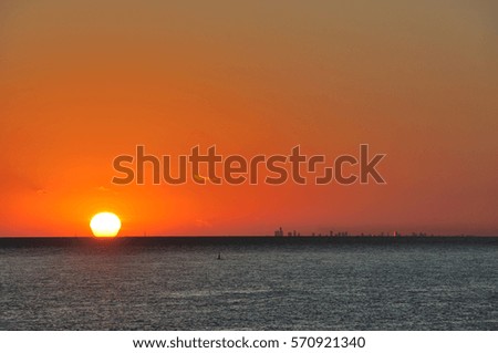 sunset at Rio de la Plata with Buenos Aires skyline