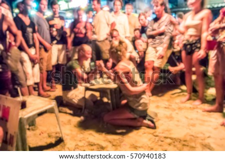 Blur background of People arm-wrestle activity in Full moon party at Phangan Island,  Thailand, Hang over in Thailand, Russian fight club, breaker activities game ,  team building 