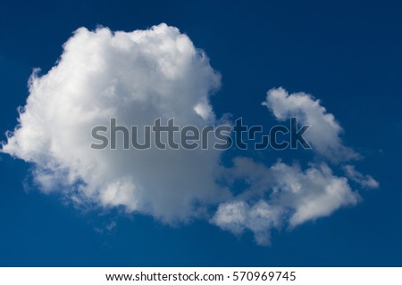 cumulus cloud, a cloud forming rounded masses heaped on each other above a flat base at fairly low altitude.