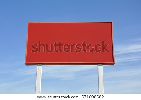 Red big blank billboard in blue skies background 