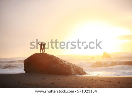 A couple on the beach in success