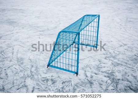 Hockey goal on an empty open air ice-ground