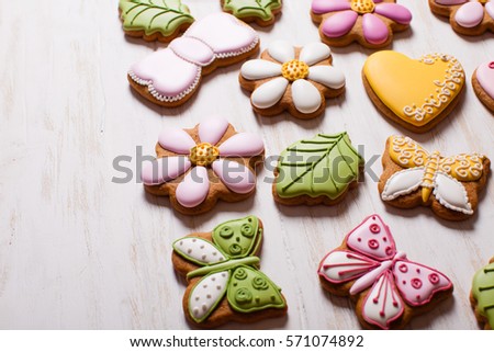 A set of delicious homemade gingerbreads of various shapes laid out on the table