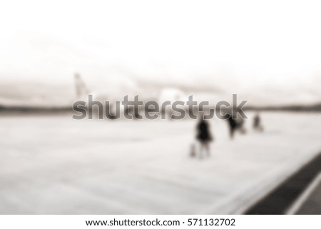 Picture blurred  for background abstract and can be illustration to article of people walking to plane in airport