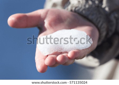 Snow in his hand boy