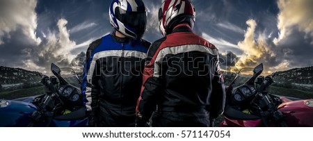 HDR composite of bikers or motorcycle riders with motor bikes on a road.  The men depict a club or are competitors in a race. The image depicts racing and motorsports.   Royalty-Free Stock Photo #571147054