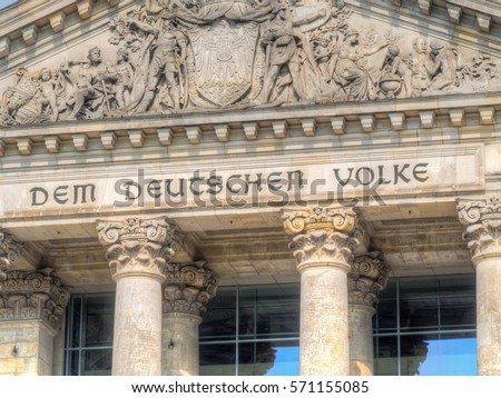 Part of German Reichstag, the German parliament building in Berlin Royalty-Free Stock Photo #571155085