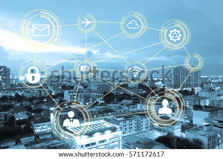 Smart city,network connection concept.Urban city scape in blue tone