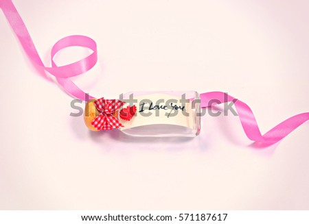 word "I Love You"  in the Bottle pink ribbon soft vintage