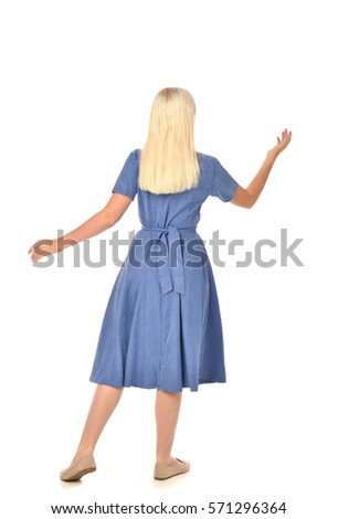 full length portrait of a blonde haired woman wearing a simple blue dress.
standing pose  isolated on white background.