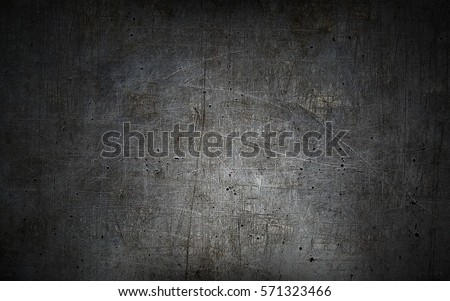 Grey grunge metal textured wall background Royalty-Free Stock Photo #571323466