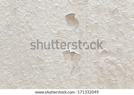 Design element texture abstract raw old paint dirty wall background.A defect in a painted wall with exposed stone.White concrete wall texture,vintage background.