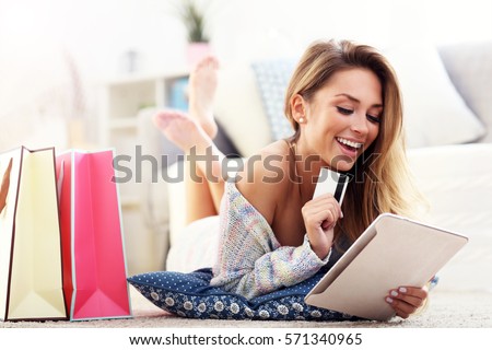 Picture showing pretty woman shopping online with credit card Royalty-Free Stock Photo #571340965