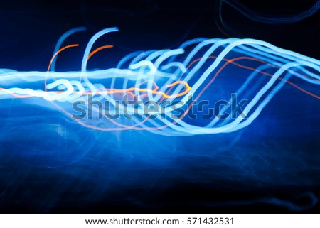 Beautiful Blue toneAbstract futuristic painting color texture with lighting effect. Modern dynamic shiny pattern. Fractal graphic artwork design. Creative long exposure photography.