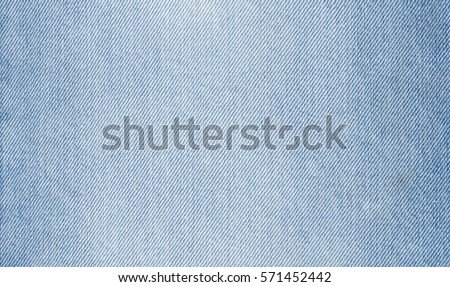 Denim jeans texture. Denim background texture for design. Canvas denim texture. Blue denim that can be used as background. Blue jeans texture for any background. Royalty-Free Stock Photo #571452442