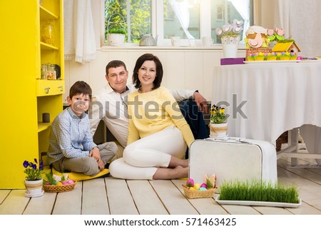 family in easter decorations