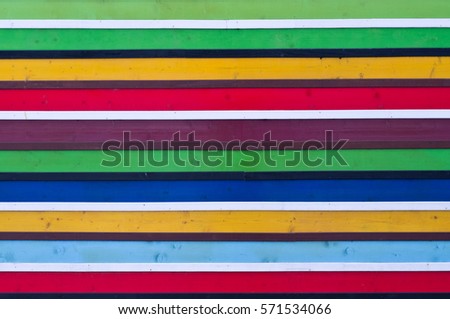 Striped colorful background made of wooden planks painted