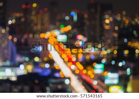Aerial view, blurred bokeh light city downtown night view