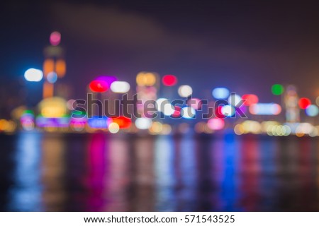 Blurred bokeh Hong Kong city downtown over Victoria Bay, night view