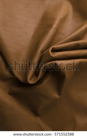 Folded original seamless natural light brown leather texture, fabric, old vintage real leather useful as a background.