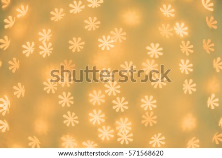 Flower shaped bokeh background. Wallpaper, texture and design.