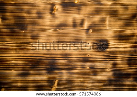 burnt wooden textured background desk. natural material